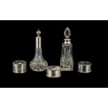 Mixed Lot of Silver to include three single napkin rings and a two scent bottles,