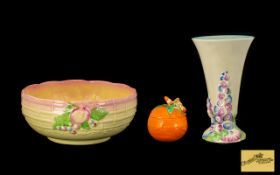 Collection of Clarice Cliff Items comprising a Clarice Cliff Newport Pottery 9" tall vase in cream