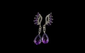 Amethyst Drop Earrings, each earring comprising a pear cut deep purple amethyst of 2.