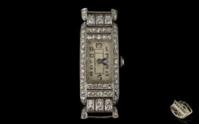 Art Deco Period - Stunning Ladies Platinum and Diamond Set Mechanical Cocktail Watch. c.1930.