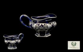 Lenox - Art Nouveau Blue Glass Jug Overlaid In Sterling Silver Stylised Floral Decoration. c.