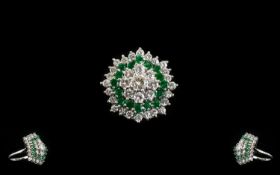 18ct White Gold Large and Impressive Emerald and Diamond Cocktail Ring - of flower head design.