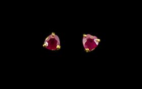 Ruby Pair of Solitaire Stud Earrings, discreetly heart cut, bright red,