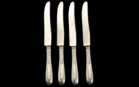 A Set of Four Sterling Silver Handled Knives with Stainless Steel blades. As new condition.