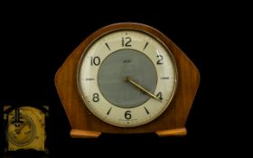Smiths Art Deco Wooden Mantle Clock Arabic numerals and chapter dial. 16 cms in height.