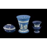 Three Pieces of Wedgwood to include Jasper Portland Blue Miniature Vase No 3077 in original