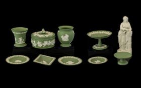 A Mixed Collection Of Wedgwood Green Jasperware To include comport, three circular dishes,