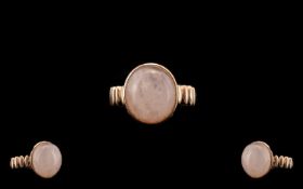 Morganite Solitaire Ring, an 10ct oval cut cabochon of natural morganite,