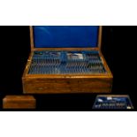 Early 20th Century Oak Cased Canteen Of Cutlery Hinged top with drop in tray, comprising forks,