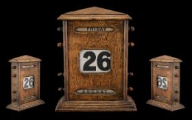 ANTIQUE LARGE OAK PERPETUAL DESK CALENDAR.