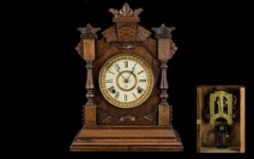 Ansonia Clock Company Stained Wood Mantle Clock of architectural form,