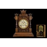 Ansonia Clock Company Stained Wood Mantle Clock of architectural form,
