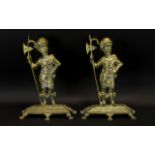 A Pair of Heavy Brass Late 19thC Pair of Figural Fire Irons in the form of two Scottish Soliders in
