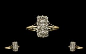 Ladies Attractive 18ct Gold Diamond Set Dress Ring of rectangular form set with 18 small round cut