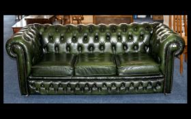 Chesterfield Three Seater Settee with three drop in seats, Raised on castors.