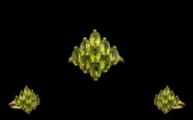 Peridot Diamond Shape Cluster Ring, nine oval cut peridots, totalling 4.