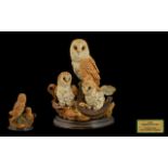 Country Artists Figurine of Three Owls on a wooden plinth 'Shadows in the Barn'.