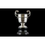 Early 20th Century Twin Handle Silver Trophy Vase, Supported on a Black Ebonised Turned Base.