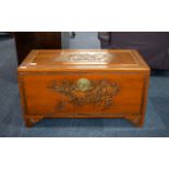 Camphor Chest, Oriental carved lid and sides depicting fighting warrior scenes.