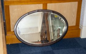 Antique Mahogany Framed Bevelled Glass Mirror.