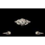 18ct and Platinum Single Stone Diamond Set Ring, Marked 18ct.