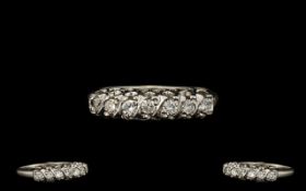 18ct White Gold - Attractive 7 Stone Diamond Set Ring, Raised Setting.