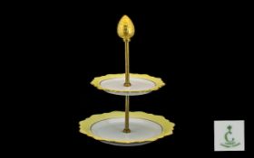 J L Cocquet French China 2-Tier Cake Stand. Yellow border with gold edging.