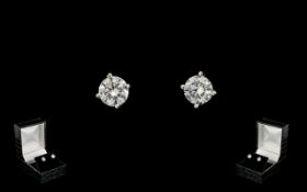 A Pair Of 18ct White Gold Diamond Stud E