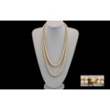 Ladies 1970's Nice Quality Double Strand Cultured Pearl Necklace of Graduated Form with a 9ct Gold
