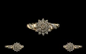 Ladies 9ct Gold Diamond Cluster Ring - Flower head Design. Marked 9.375. Diamond Weight 0.