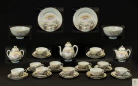 Japanese Porcelain Tea Set marked to base, comprising a coffee pot; 12 trios of cups,