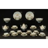 Japanese Porcelain Tea Set marked to base, comprising a coffee pot; 12 trios of cups,