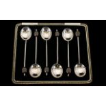 SILVER COFFEE BEAN SPOONS.