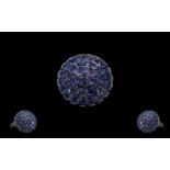 Tanzanite Trillion Cut Cluster Ring, three circular rows of trillion cut tanzanites surrounding a