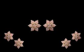 Pink Opal Flower Cluster Earrings, each earring comprising seven round cut pink opals,