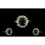 Ladies Superb Quality 18ct Gold - Attractive Sapphire and Diamond Cluster Ring.