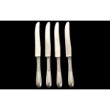 A Set of Four Sterling Silver Handled Knives with Stainless Steel blades. As new condition. Please