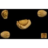 Oriental Netsuke in the Form of an Open Hand. Signed to base. Length 1.5 inches.