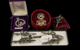 Collection of Scottish Clan Related Jewellery comprising a Clan Bethune/Macbeth white metal badge,