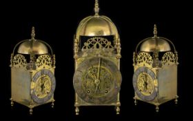 An Early to Mid 20th Glass Lantern Clock, Spring driven with pendulum,