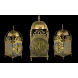 An Early to Mid 20th Glass Lantern Clock, Spring driven with pendulum,