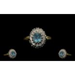 18ct Gold - Aquamarine and Diamond Set Cluster Ring, Flower head Design. Excellent Gallery Setting.