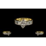 A Stunning Quality 18ct Two Tone Gold Marquise Diamond and Baguette Cut Diamond Ring of Contemporary