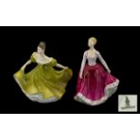 Two Royal Doulton Figurines comprising 'Lynne' HN2329, a lady in a full ochre coloured dress,