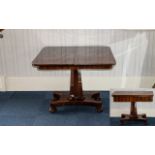 A Victorian Mahogany Tilt Top Tea Table on quatrefoil base and lift-over top with bobbin feet.