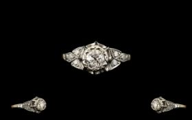 18ct and Platinum Single Stone Diamond Set Ring, Marked 18ct. The Single Stone Round Diamond of