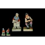 Staffordshire 19th Century Hand Painted Pair of Pearl Ware Figures ' The Cobbler and His Wife '