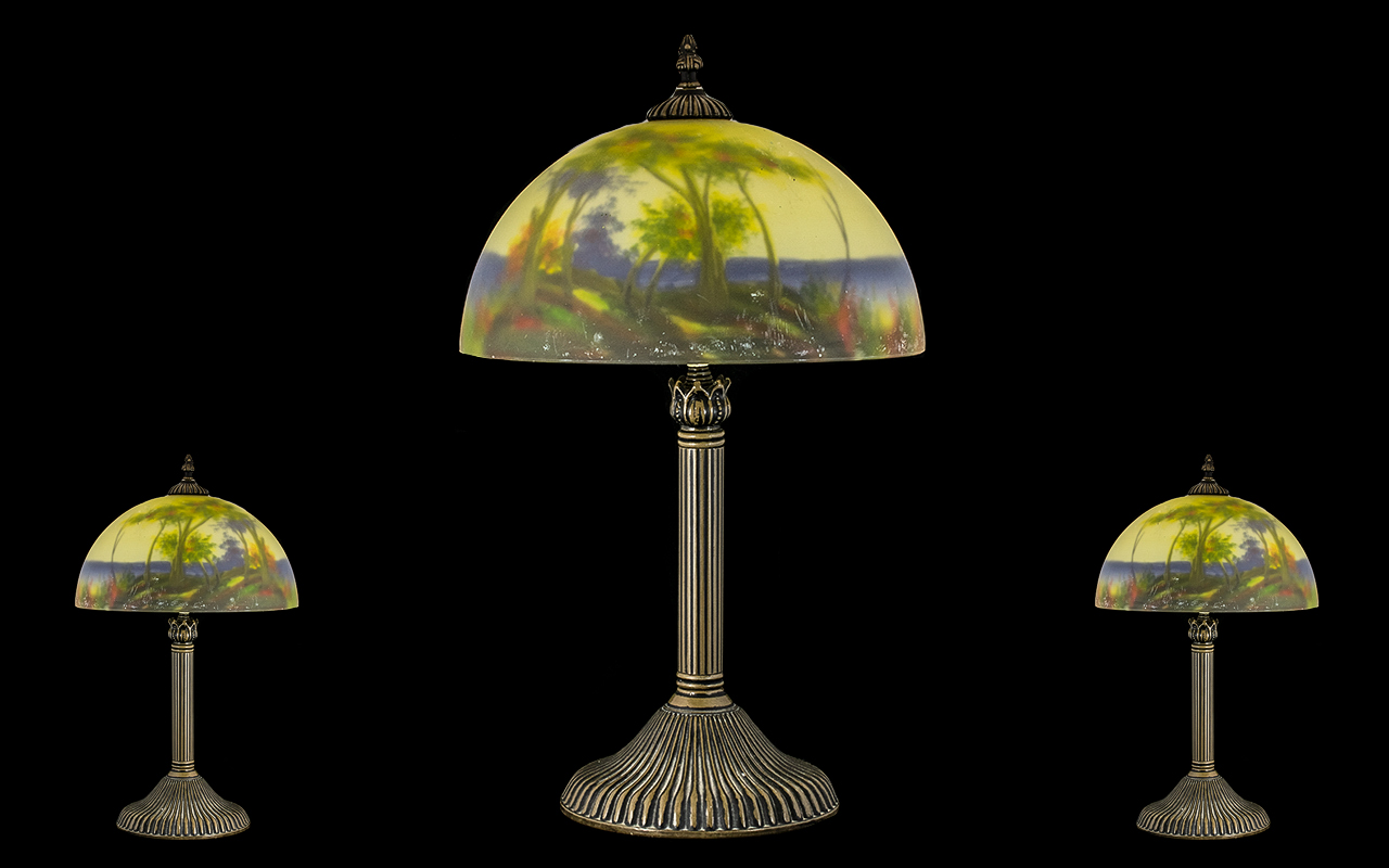 French Daum Style Table Lamp with painted landscape shade. Antique bronze mount. Height 20 inches.