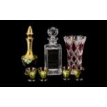 A Ruby Red Venetian Style Decanter and Glass Set comprising decanter and four glasses.