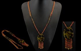Art Deco Long Cut Metal Bead And Faux Tortoiseshell Necklace African influence long beaded
